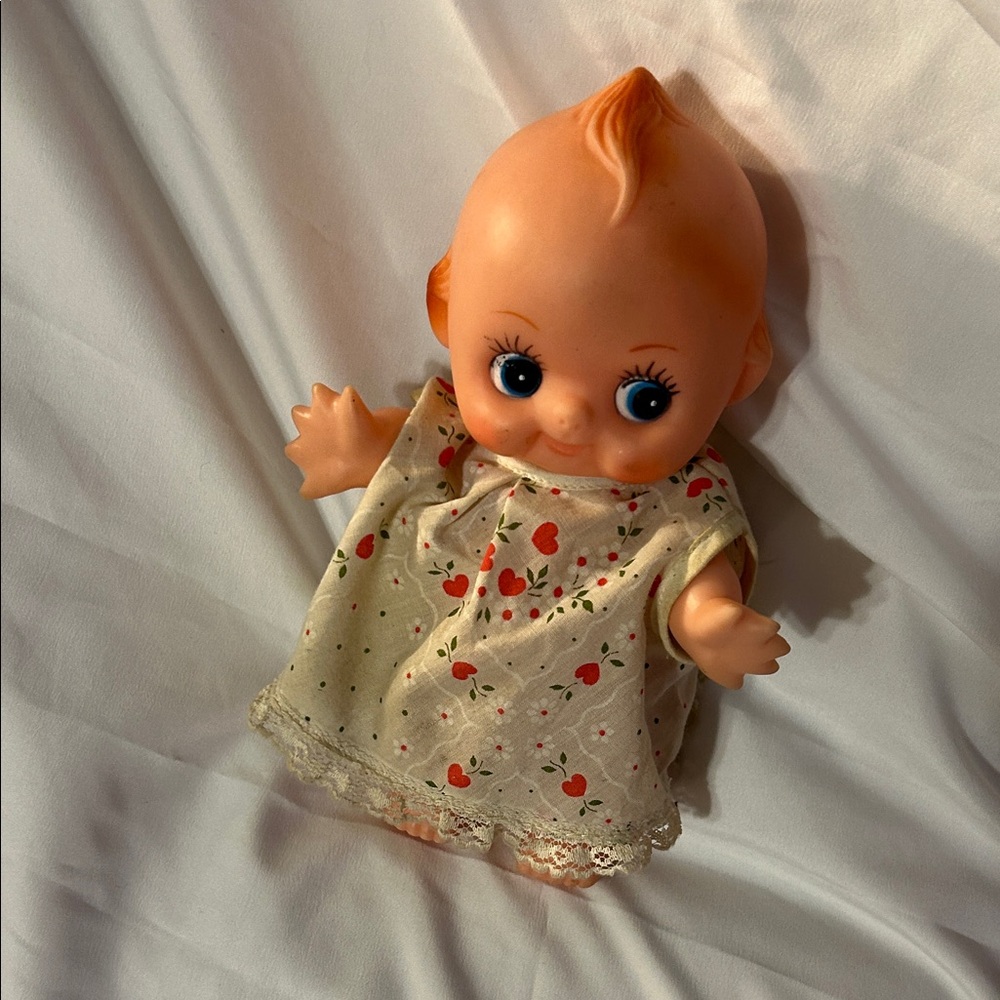 Kewpie doll  vintage poseable arms& legs about 8”tall. Marked on back- Taiwan??